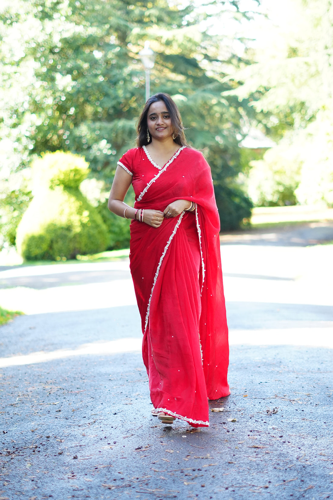 An Elegant Red Organza Saree with Pearl-Embroidered Border❤️
