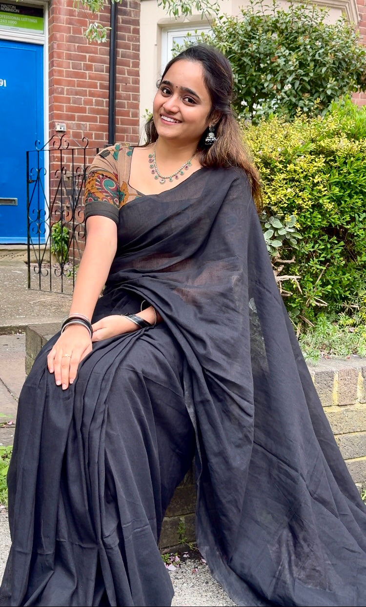 Pure Elegance Black Soft Cotton Saree with Subtle Sheen and Artistic Blouse